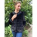 Женская короткая шубка с украшением на рукавах и горловине